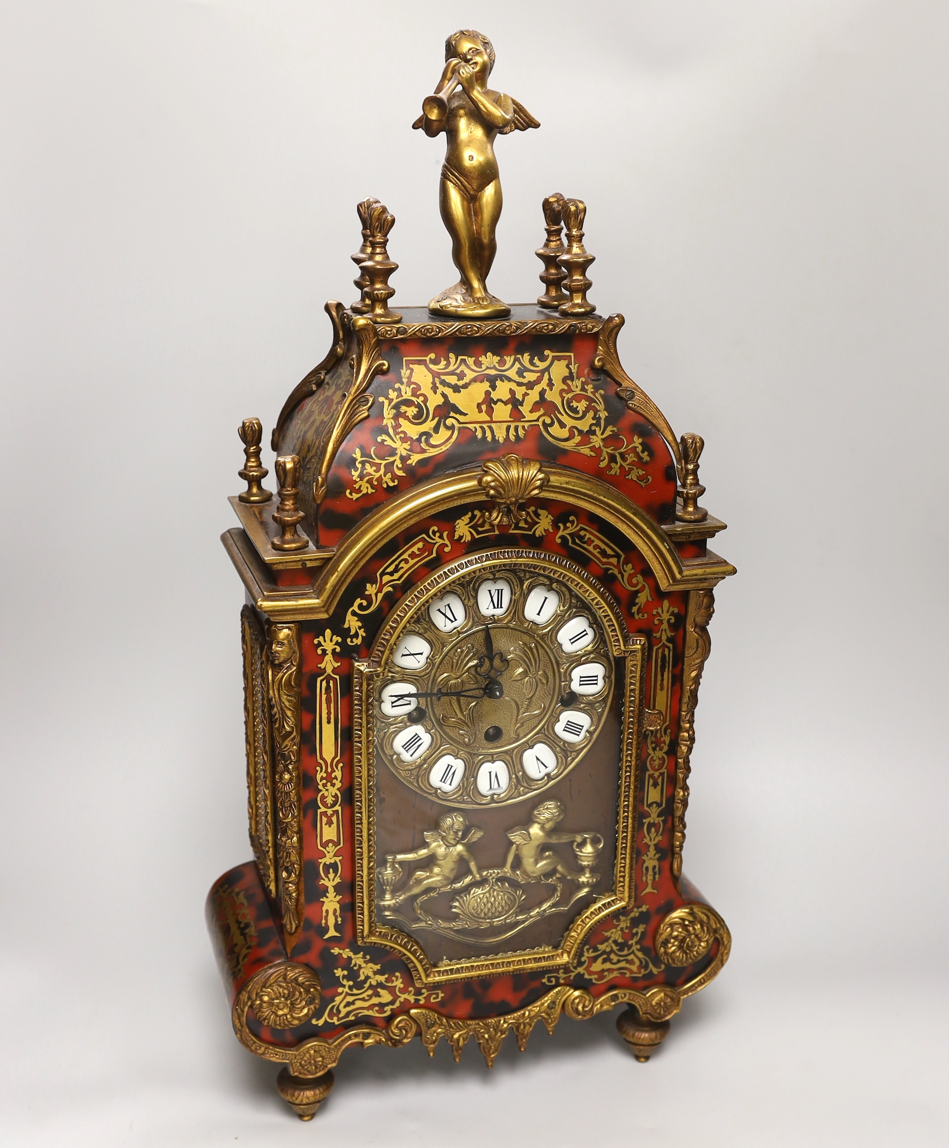 A reproduction boullework mantel clock in period style, 56cm
